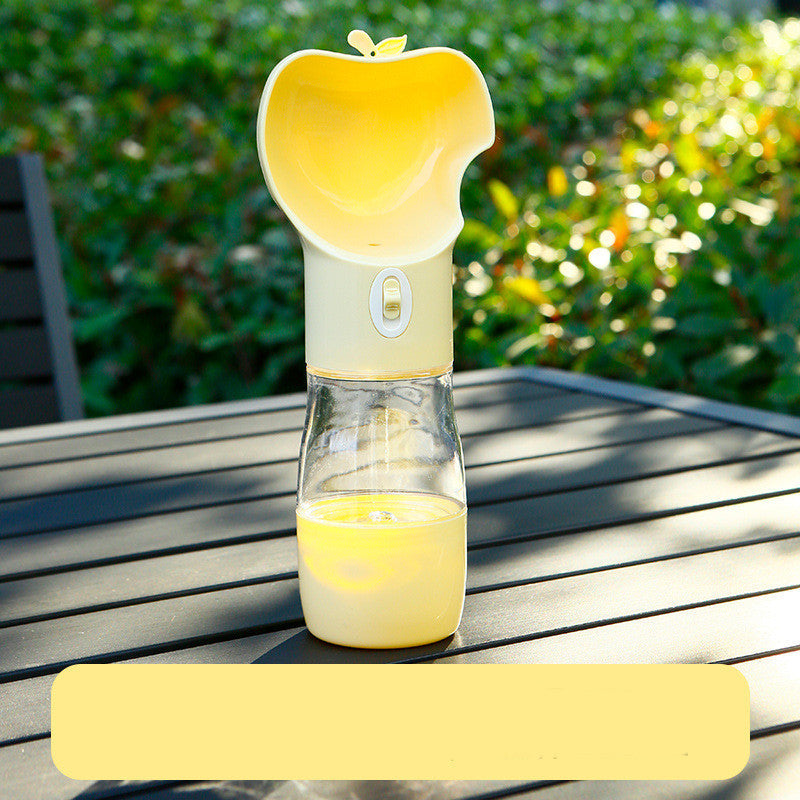 2-in-1 travel water cup clipped to a bag for walks