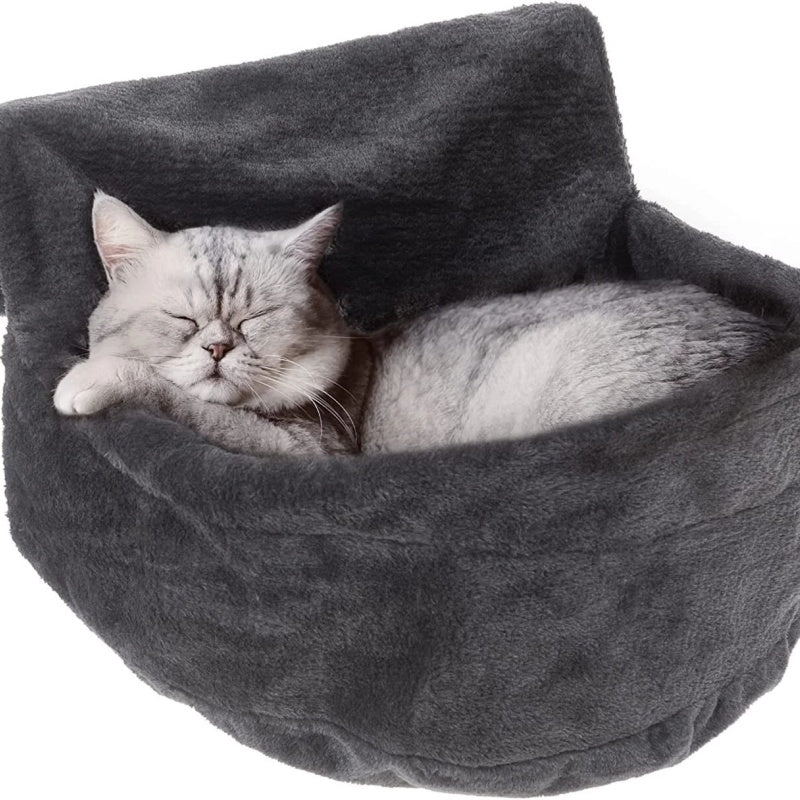 Two cats sharing a radiator hammock bed