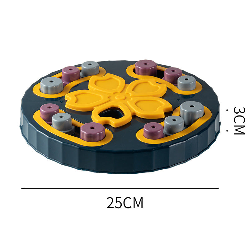 Rolling treat dispenser toy filled with kibble