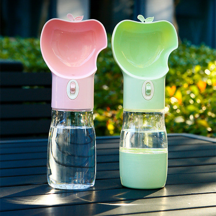 2-in-1 travel cup shown open with separate water and food sides